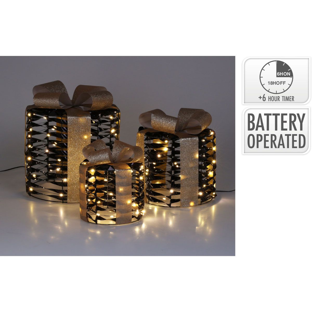Set van drie zwart-gouden kerstcadeaus met warmwitte LED-verlichting in verschillende hoogtes