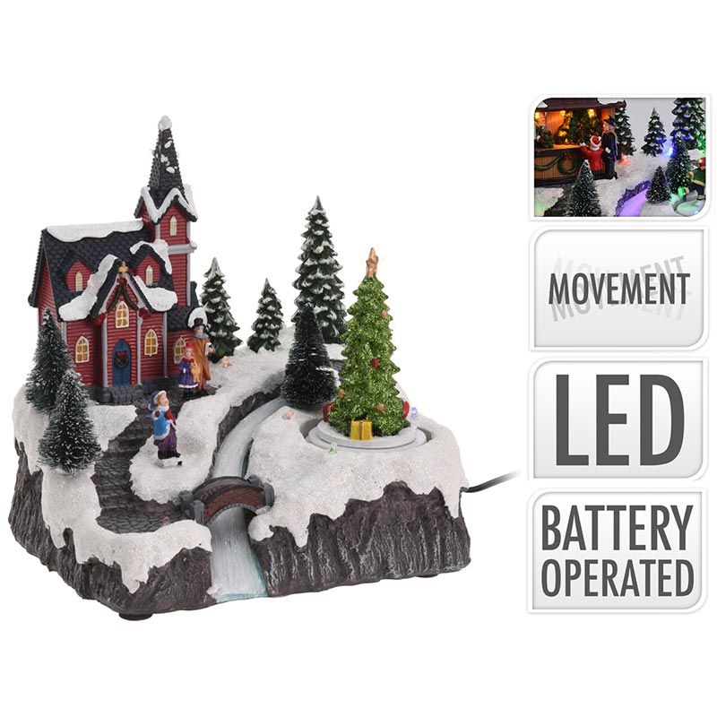Verlicht miniatuurkerkje met besneeuwd landschap en draaiende kerstboom